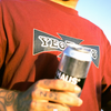 Kurt with a Yeo Haus beer and tee, with a small CLUB YEO label.